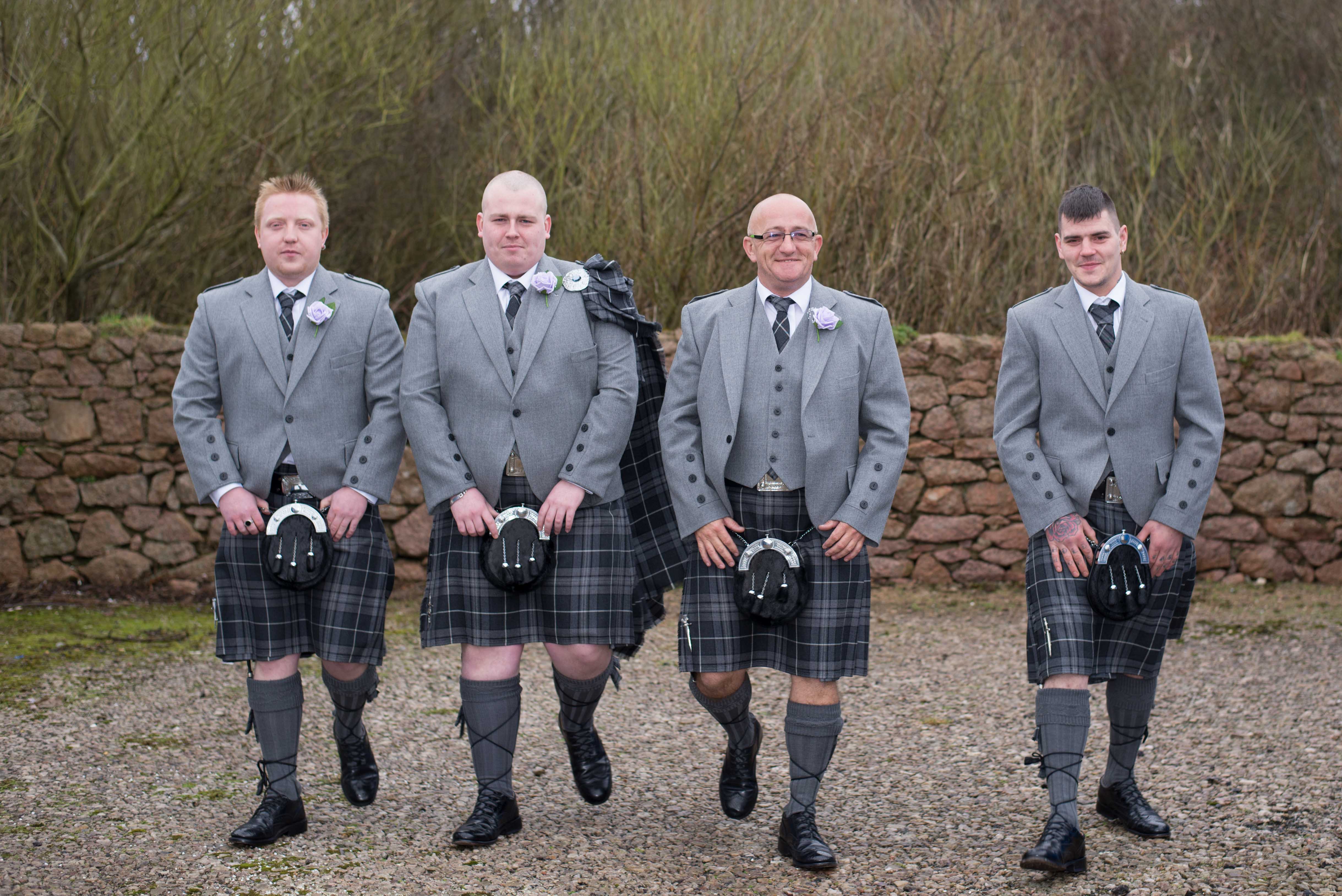 grooms men walking